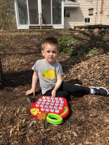 Declan playing in the back yard giving us a glimpse of the beautiful side of autism